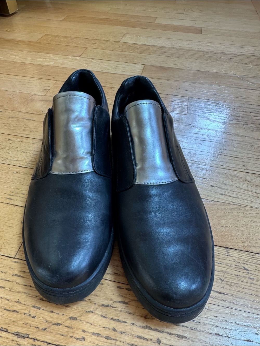 Prada Black Leather Slip-On Loafers with Metallic Throat Panel